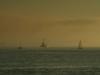 three vessels at sea
